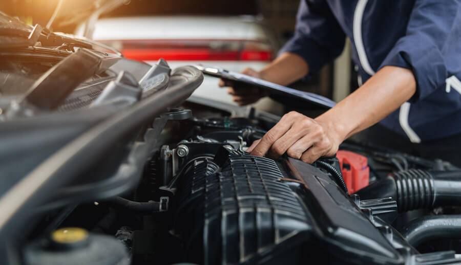 mechanic fixing car