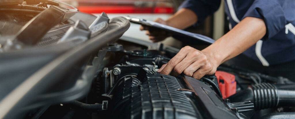 mechanic fixing car