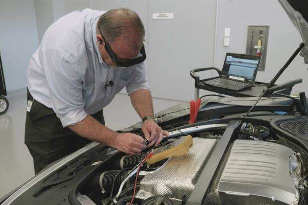 mechanic fixing car