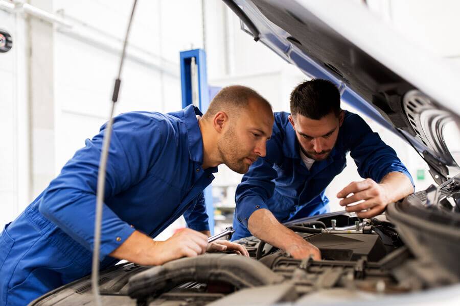 mechanic working on engine